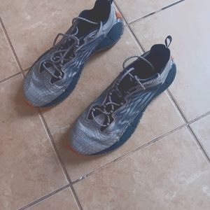 Men's Reebok. Size 12. Dark Grey, Light Grey and Black in color.